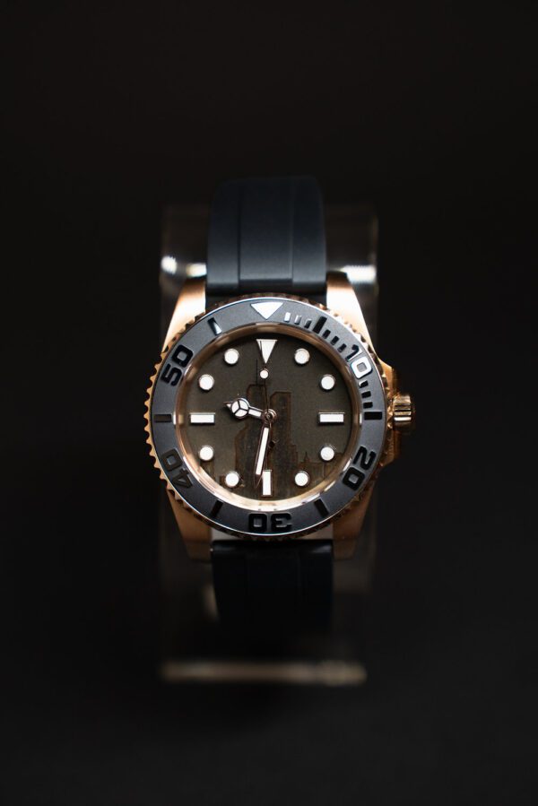 The Rose Gold watch displayed on a black background