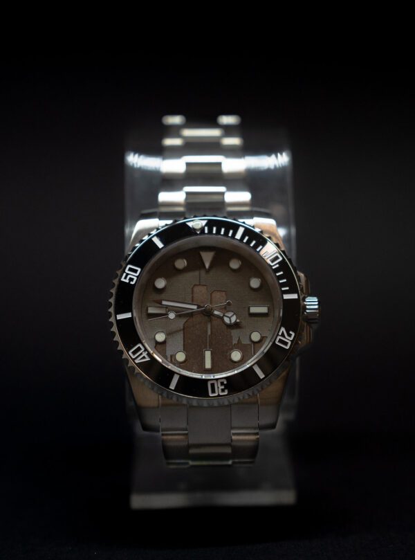 Front angle of the Stainless Steel watch on a black background